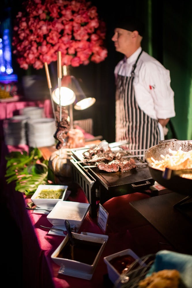 a person sitting at a table with food
